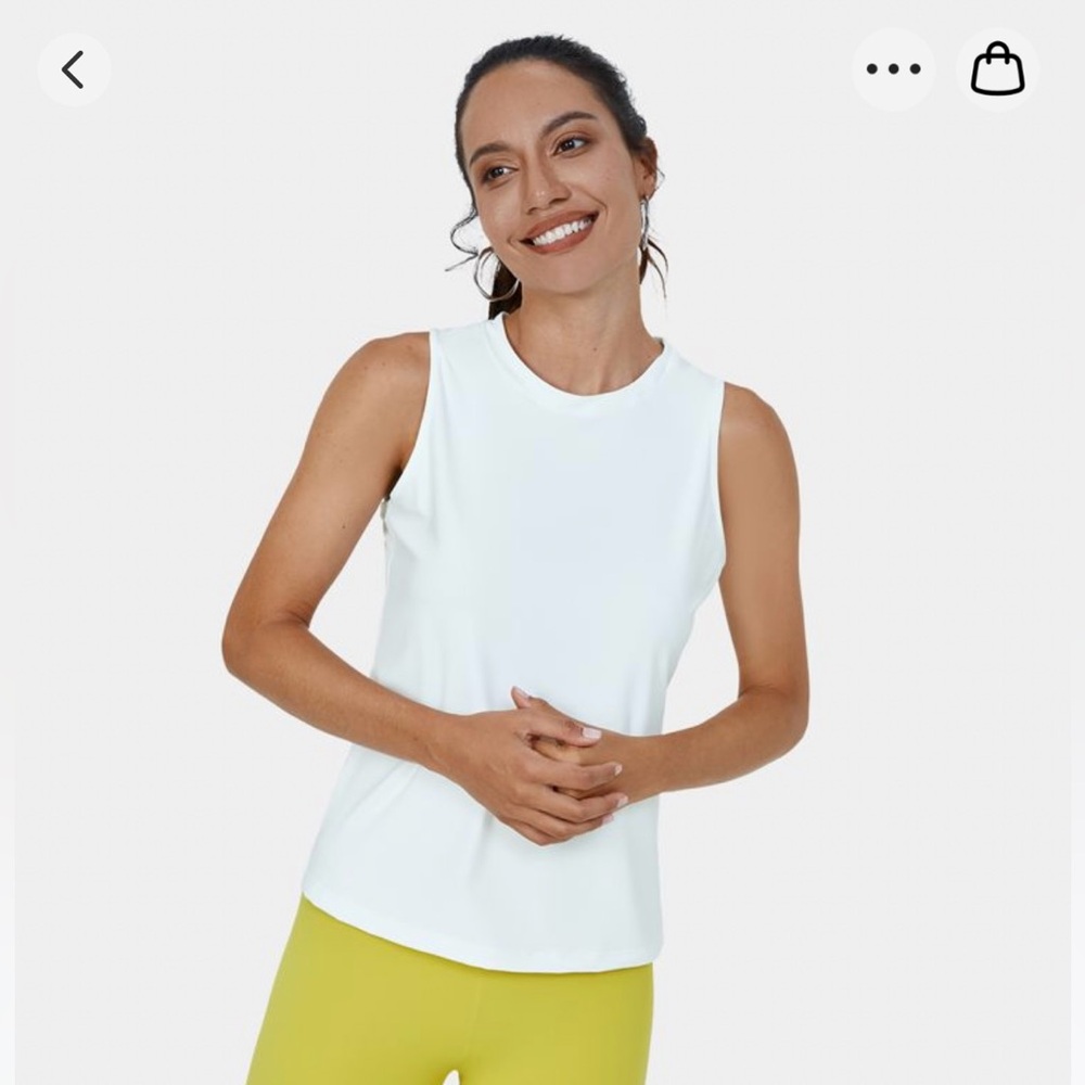 Halara cut out cross over tank top. White. Size XL